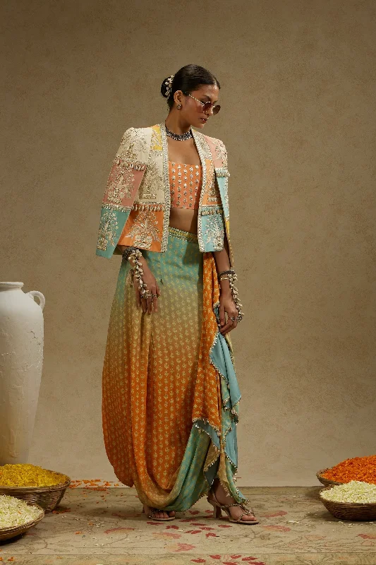 COLOUR BLOCKED PATCHWORK CAPE JACKET PAIRED WITH AN EMBELLISHED BUSTIER AND AN OMBRE PRINTED DRAPED SKIRT Jersey Jacket Tulle Jacket Batik Jacket