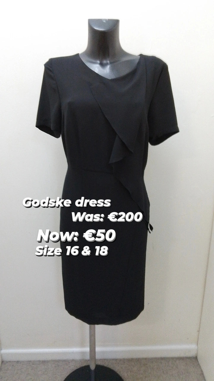 18474 Godske Ruffle front black dress
